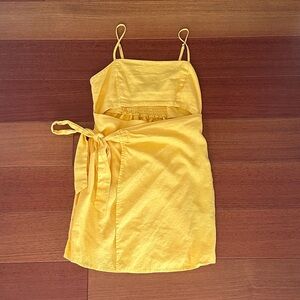 Yellow cut-out mini wrap dress